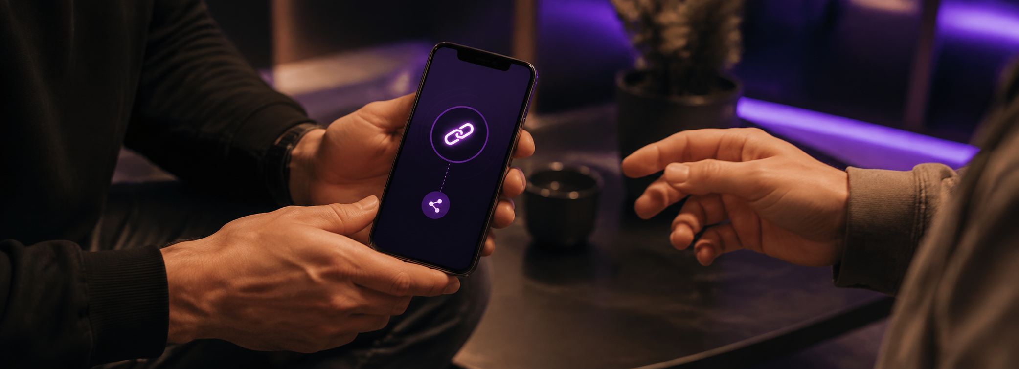 Hands holding a phone with a TopSend tracking link