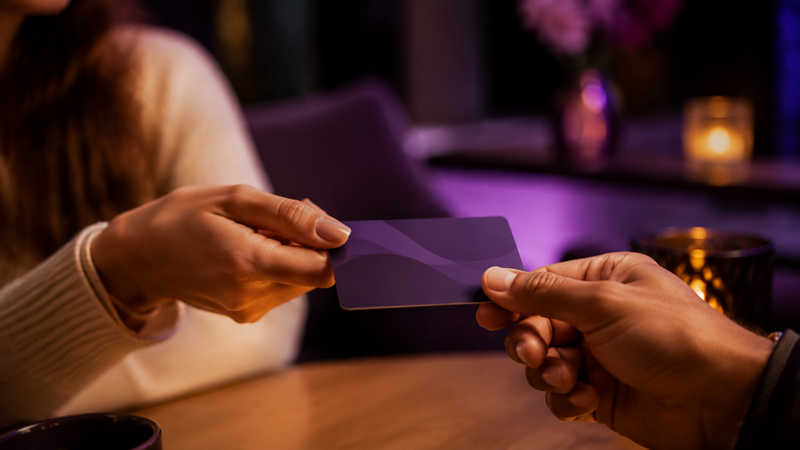Handing over a gift card